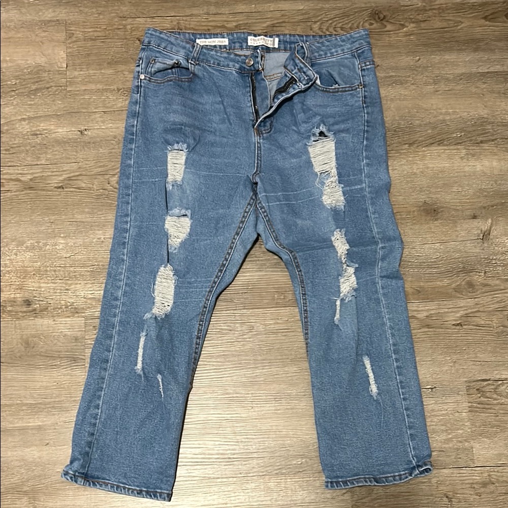 Relaxed Blue Distressed Jeans with Rips and Vintage Look